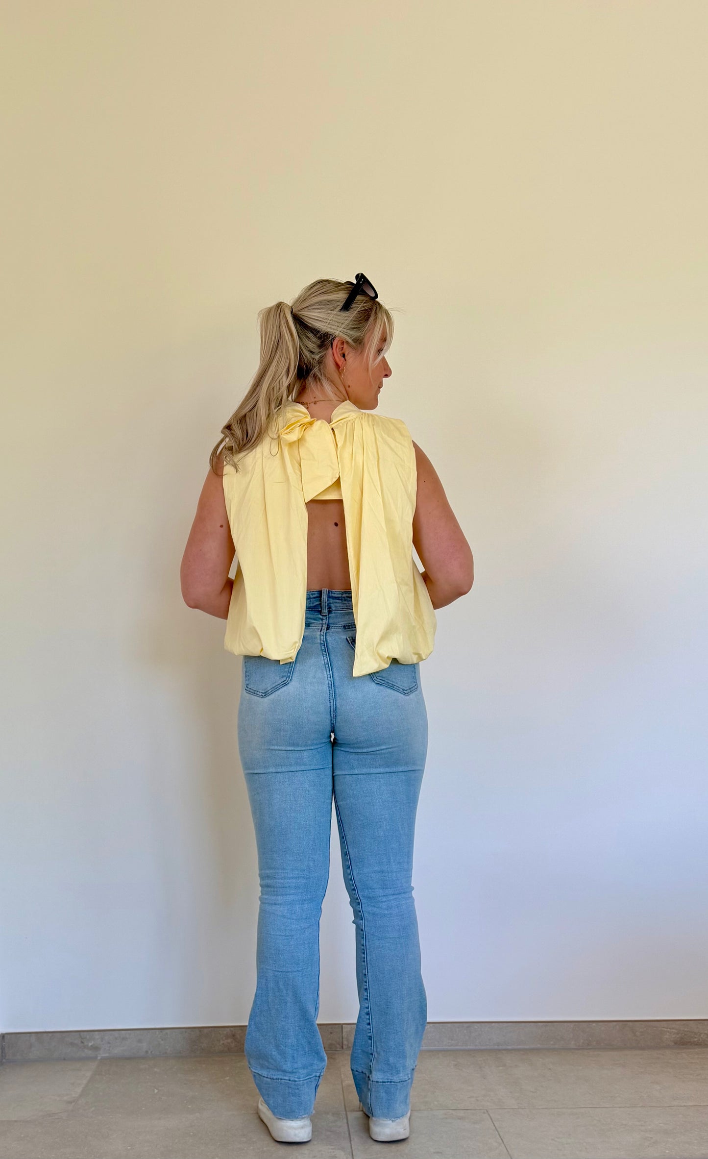 Open back yellow blouse